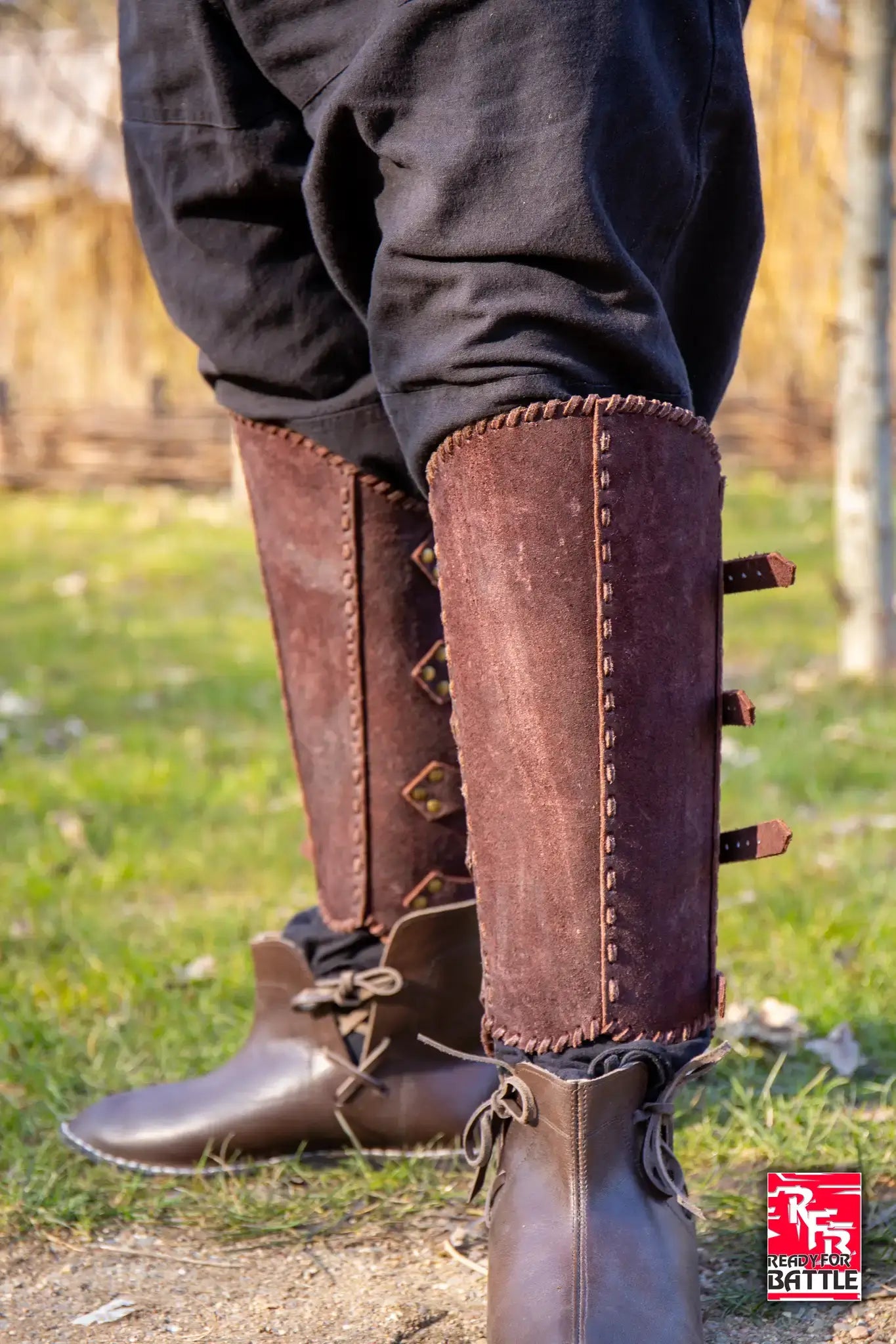 Leather Armor Legs: Brown leather greaves and boots, offering protection and style for combat and cosplay.