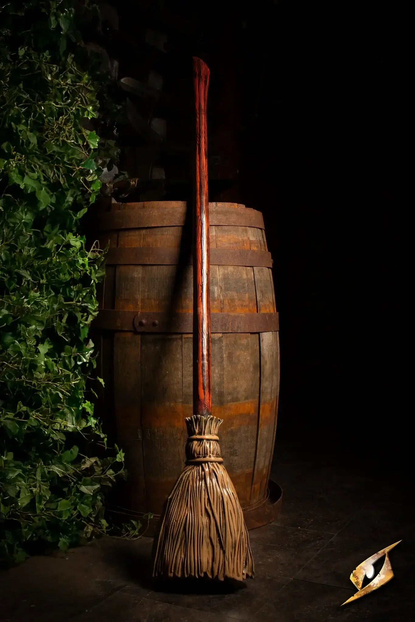 Tavern Brawl Collection broom prop leaning against a wooden barrel in an atmospheric setting.