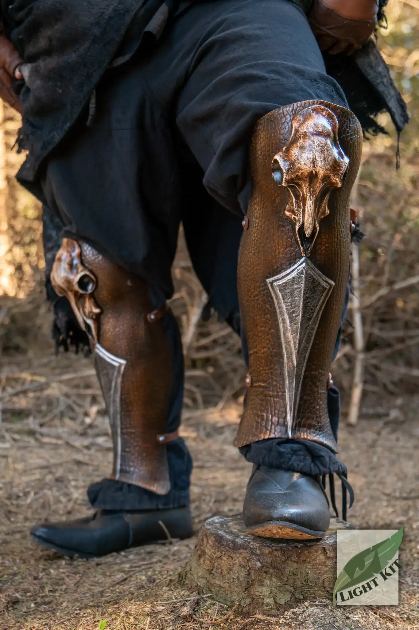 Person wearing PU Armor Greaves with intricate design, showcasing leg protection for an armored look.