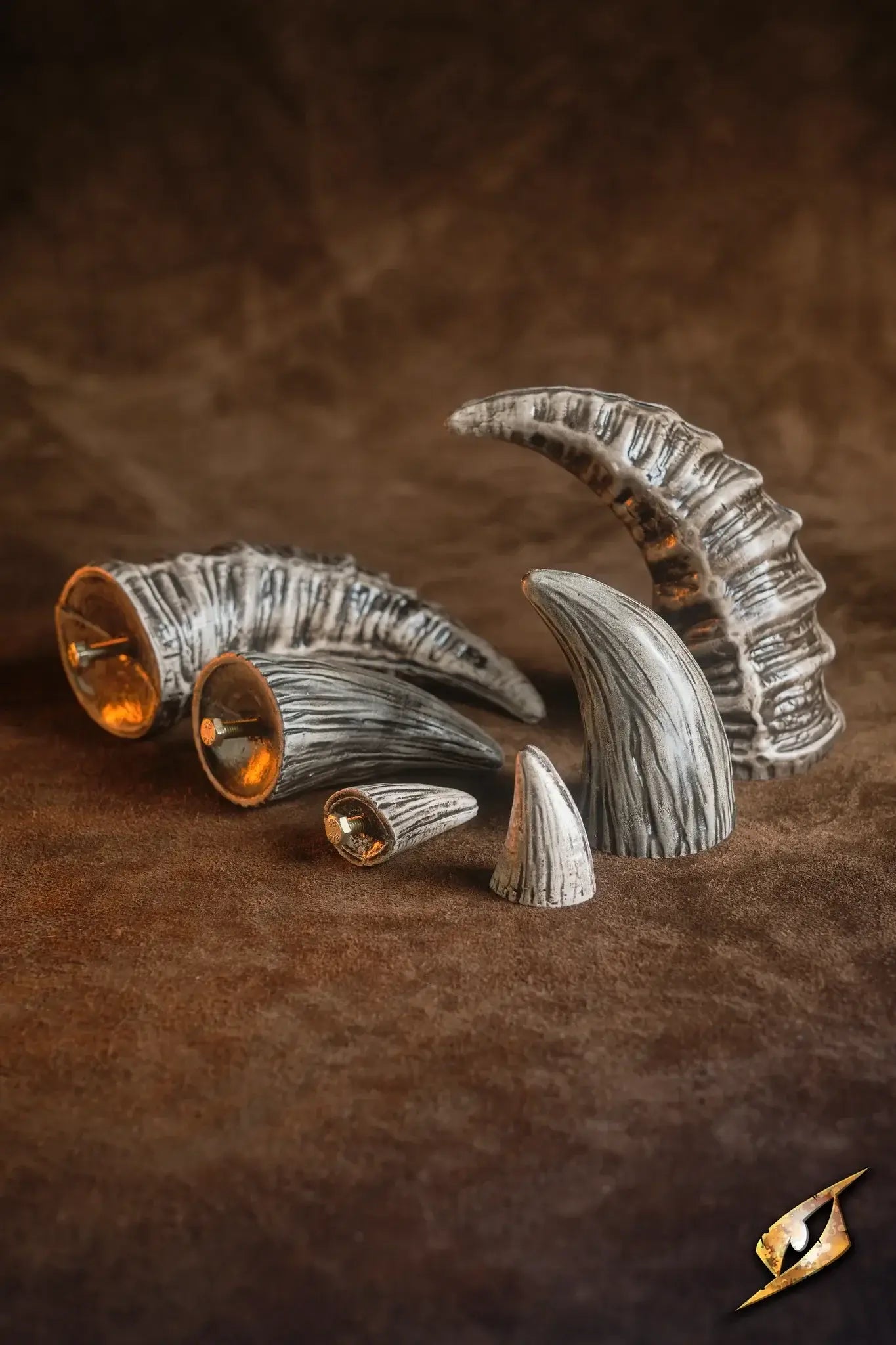 Mountable Demon Horns displayed on a brown background, ideal for enhancing monster-themed costumes.