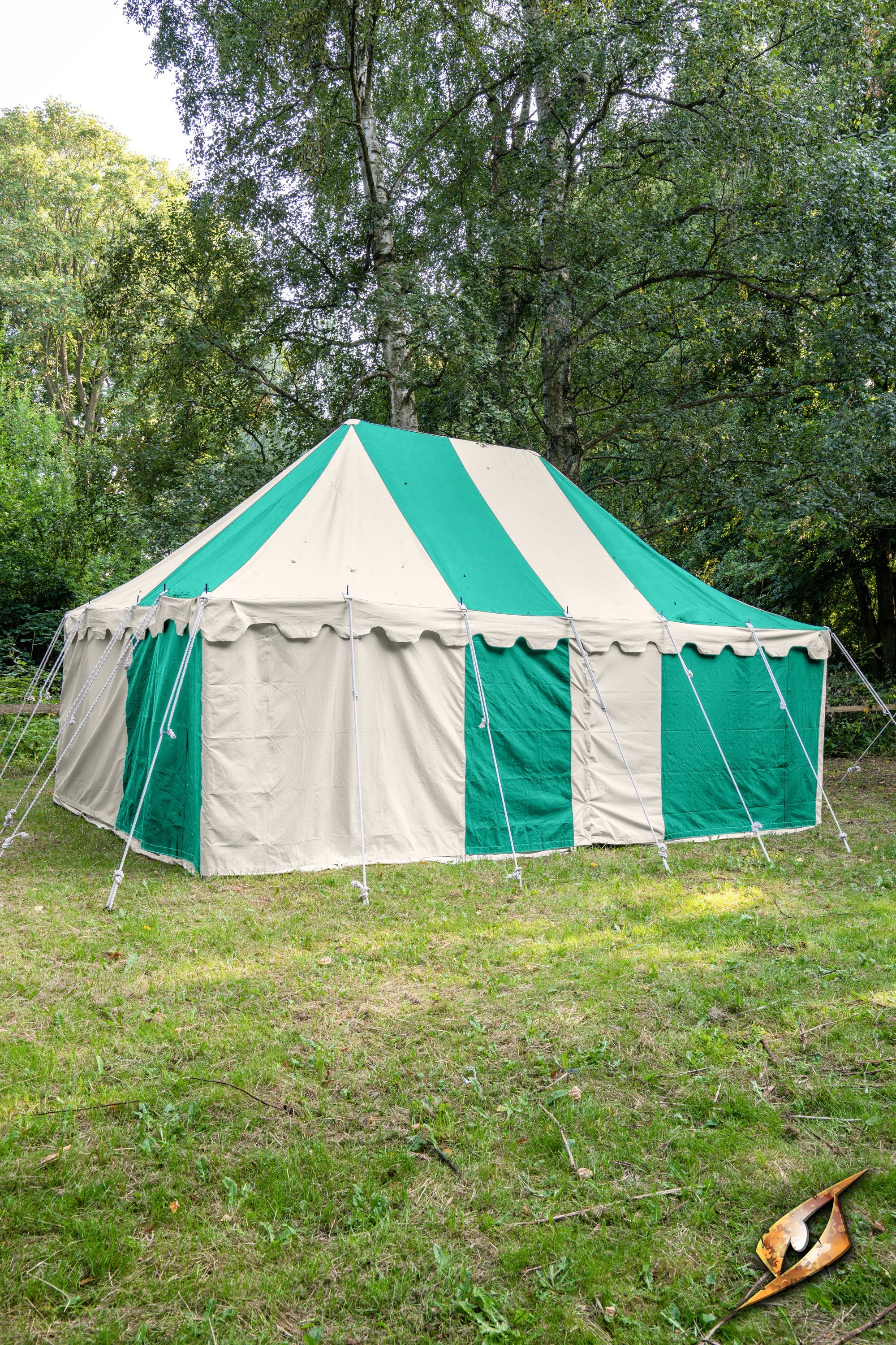 Marquee Tent - 4x6m set up in a green and white striped design in a grassy outdoor area.