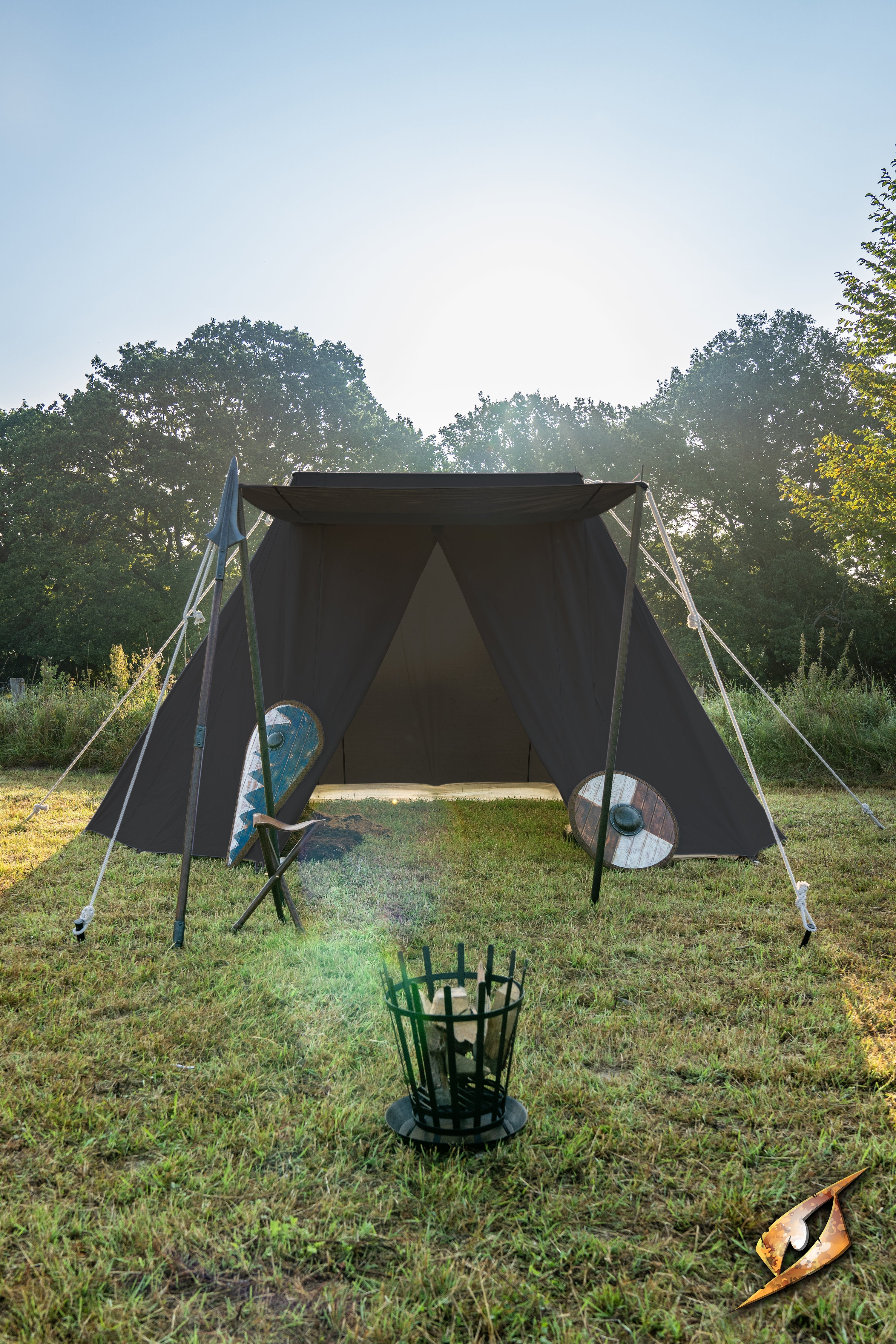 Double Wedge Tent - 3x5 m set up in a grassy campsite with a morning sun backdrop.