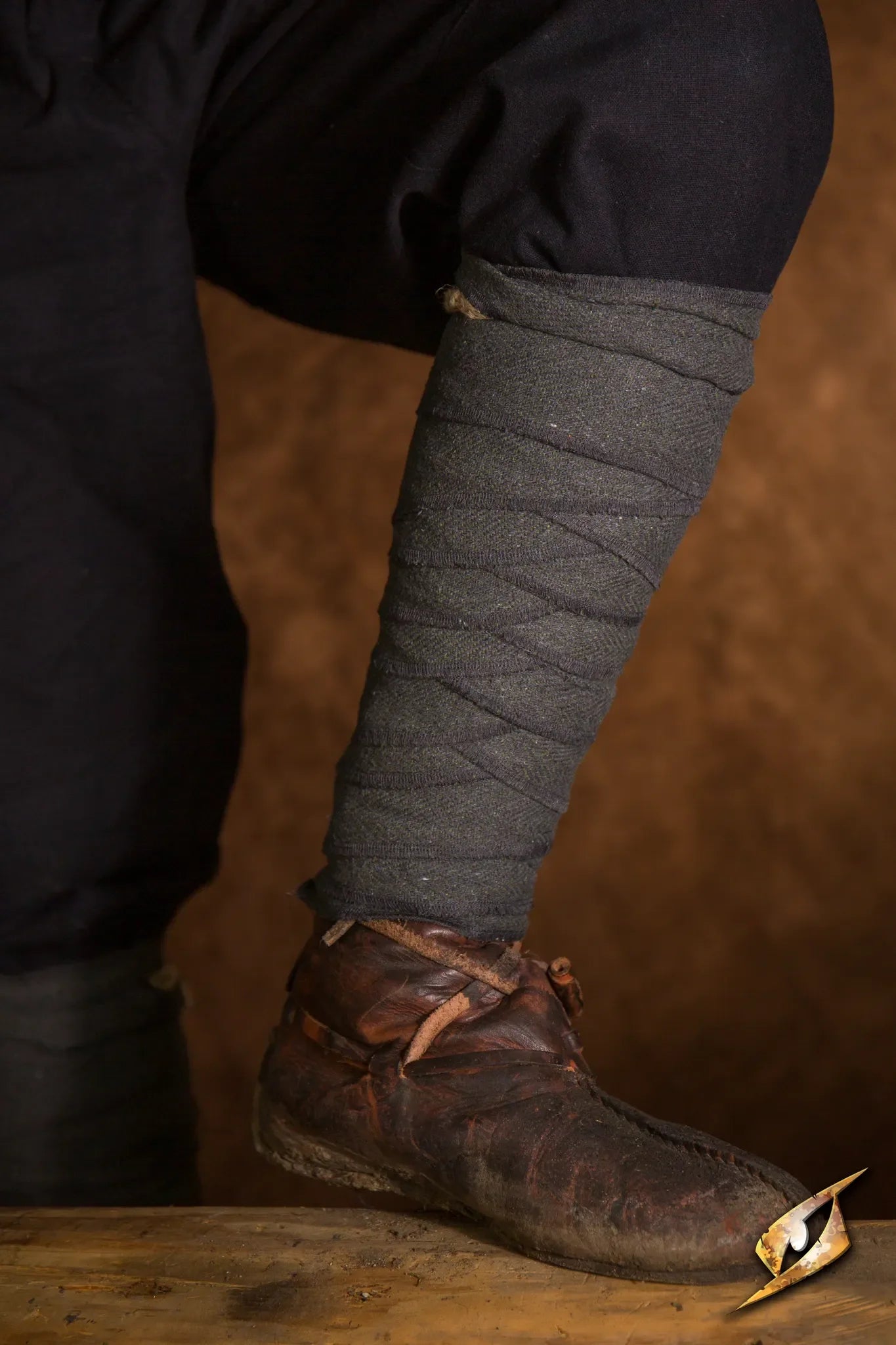 Woodland Leg Wraps worn on a boot, showcasing historical leg protection and stylish design.