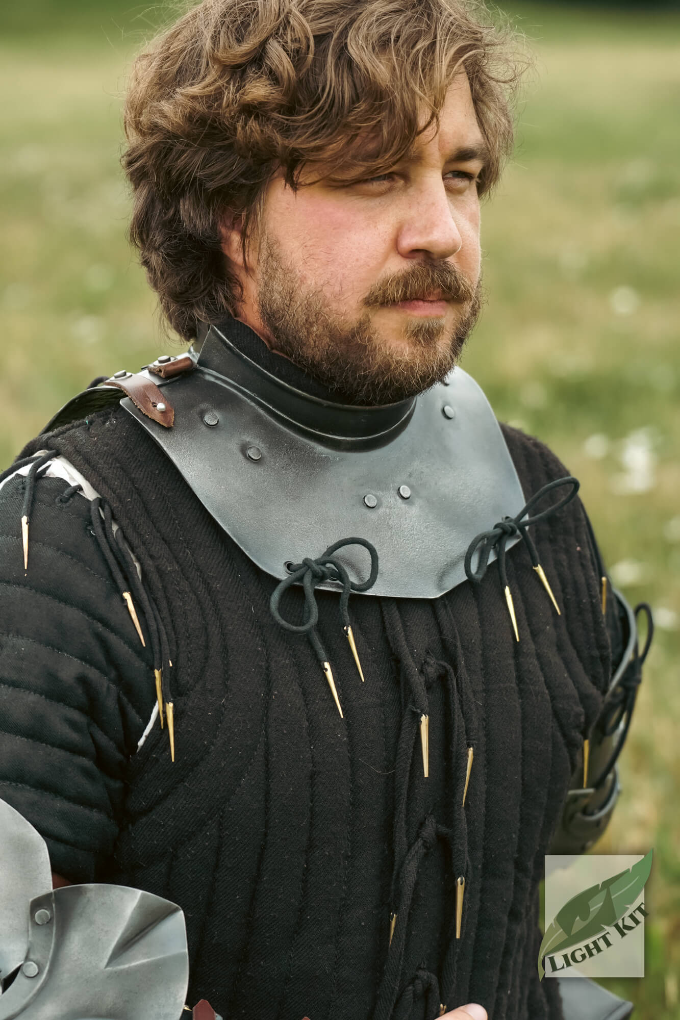 Man wearing Captain Gorget - Light Kit with standing collar, showcasing polyurea armor protection and historical style.