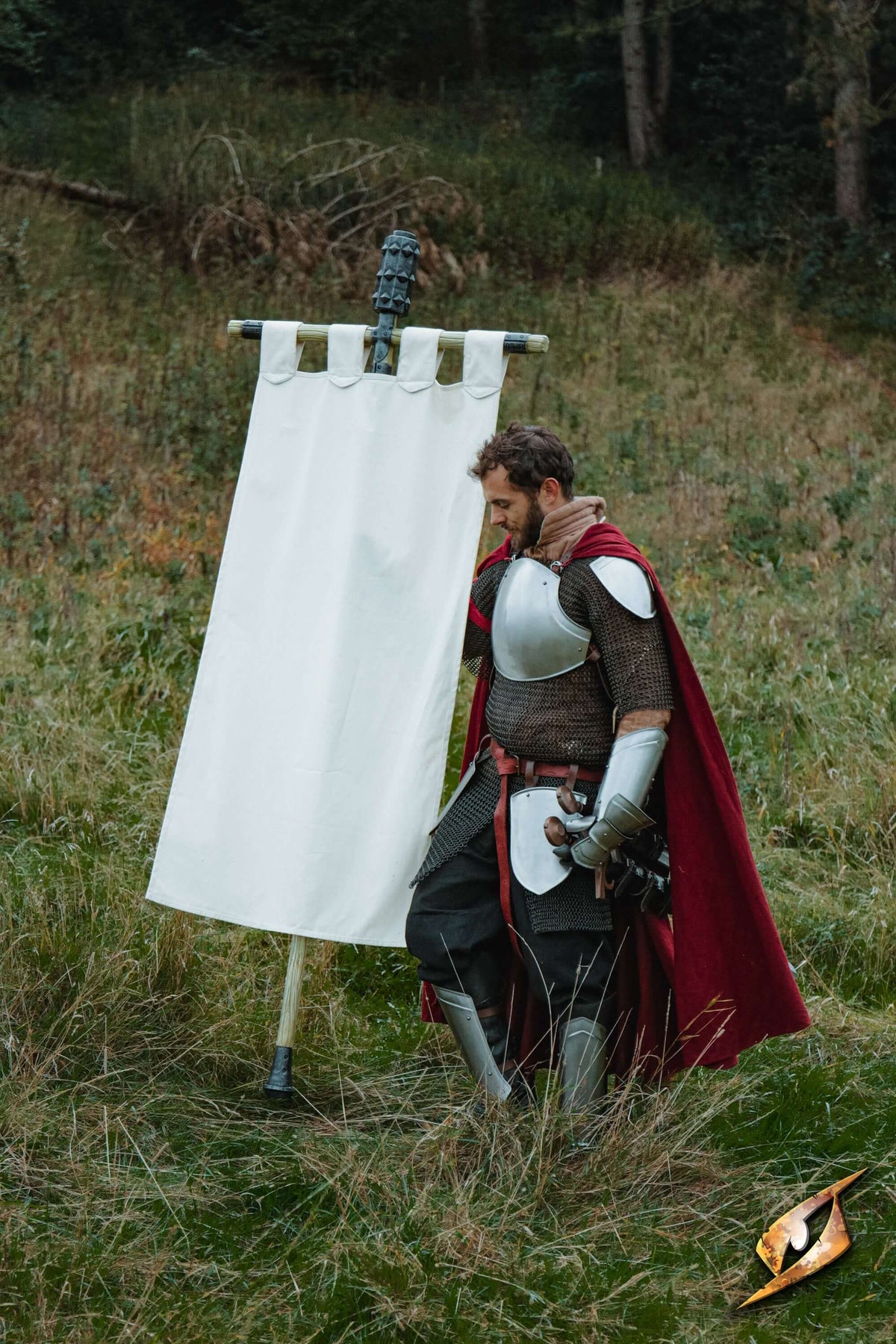 Complete Battle Standard Set - Spiked Mace Top displayed by a knight in armor holding a sword in a grassy field.