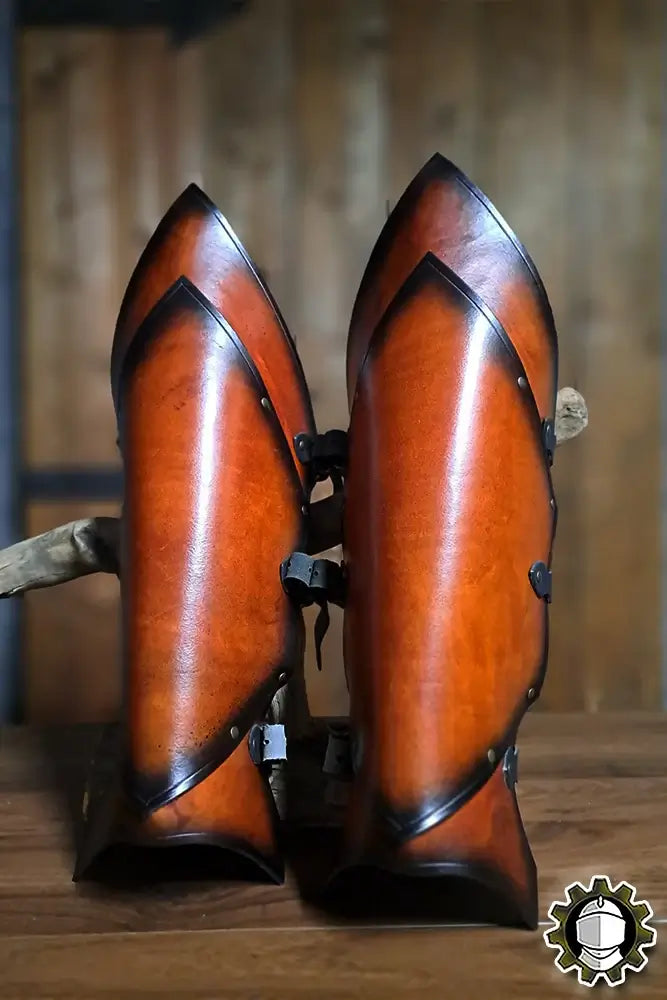 Leg Protection Senua (Fighter) crafted leather greaves featuring a sleek design and secure fastening.
