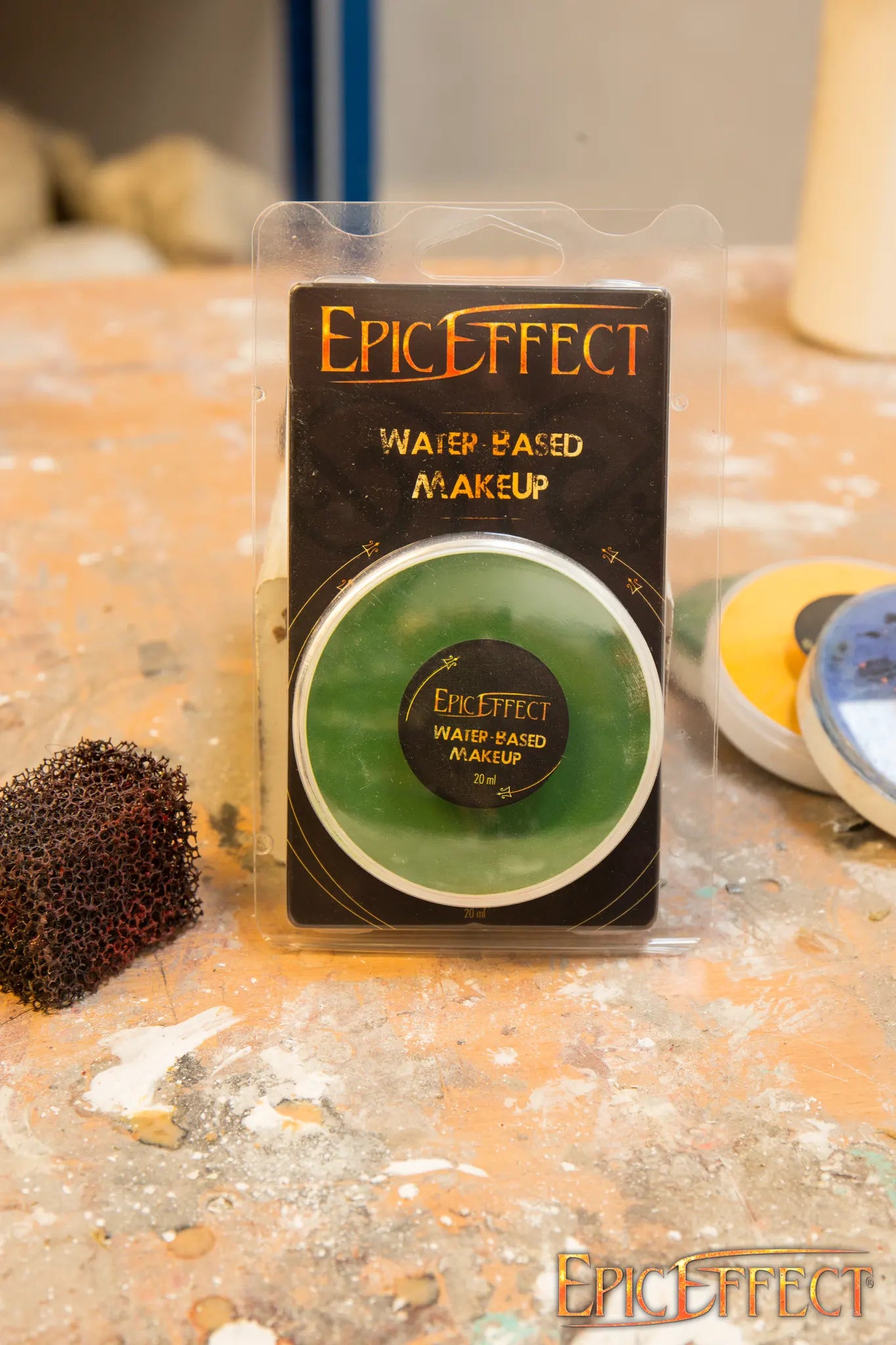Water Based Make Up - Dark Green by Epic Effects in compact powder form, showcased on a surface with sponge.