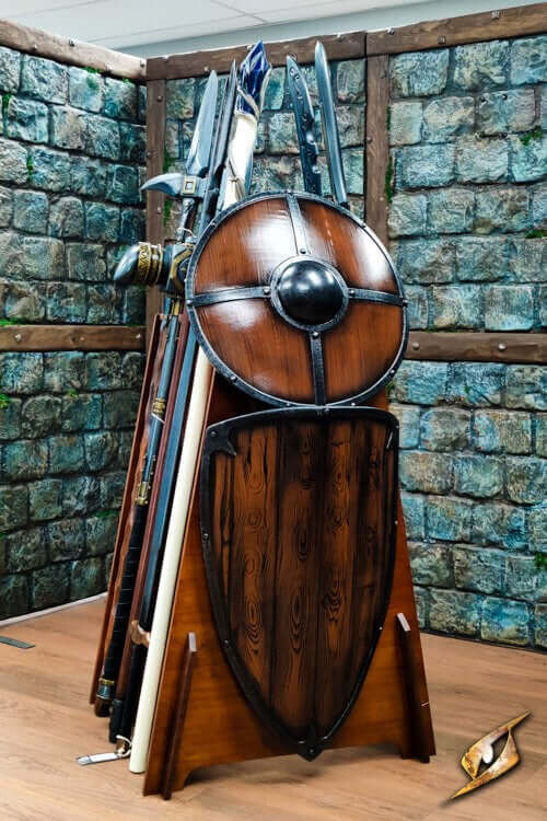 Medieval weaponry display featuring swords, axes, polearms, and shields in an epic armor collection.