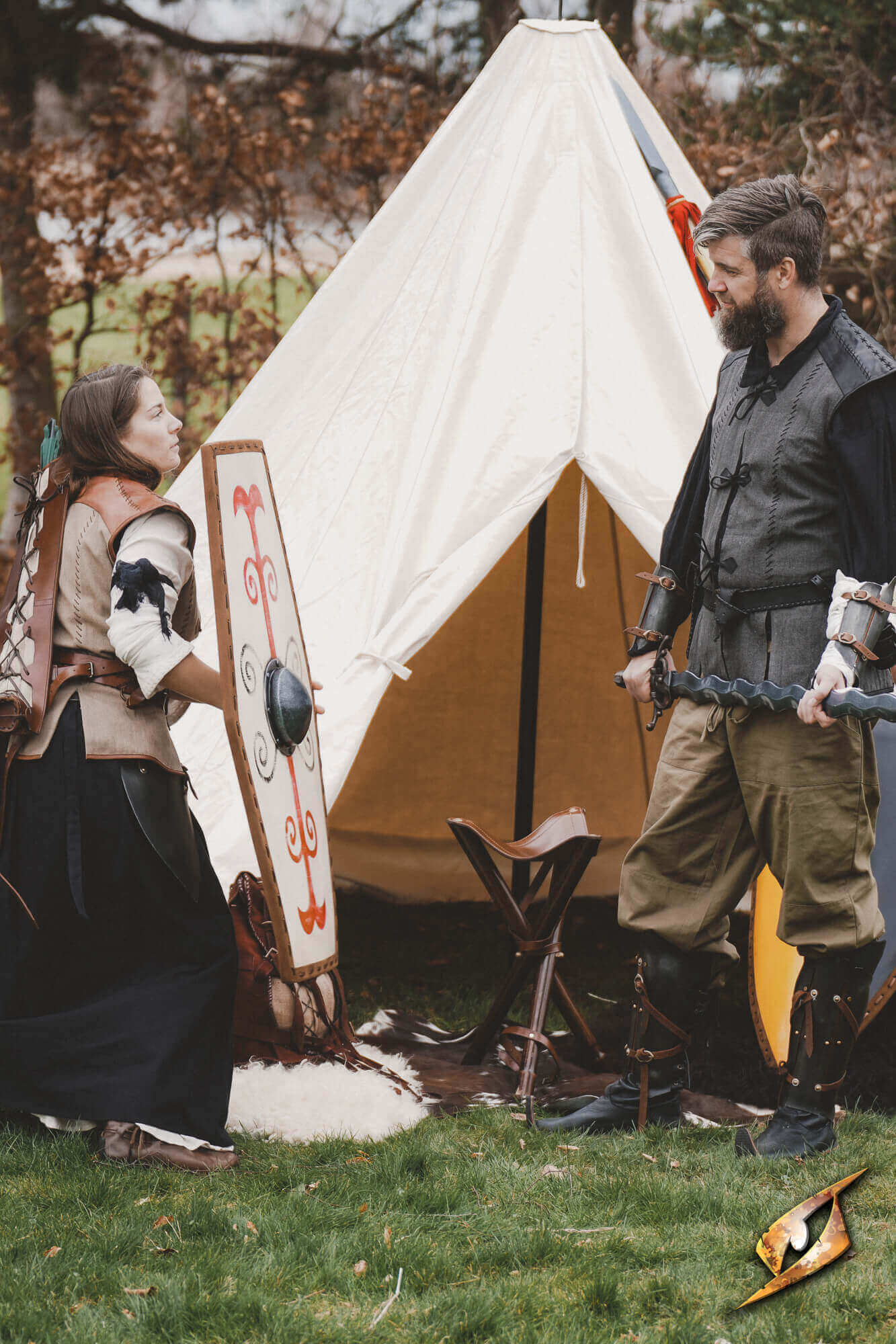 Adventure & Camp Gear: Adventurers preparing food by a campfire in a forest setting.