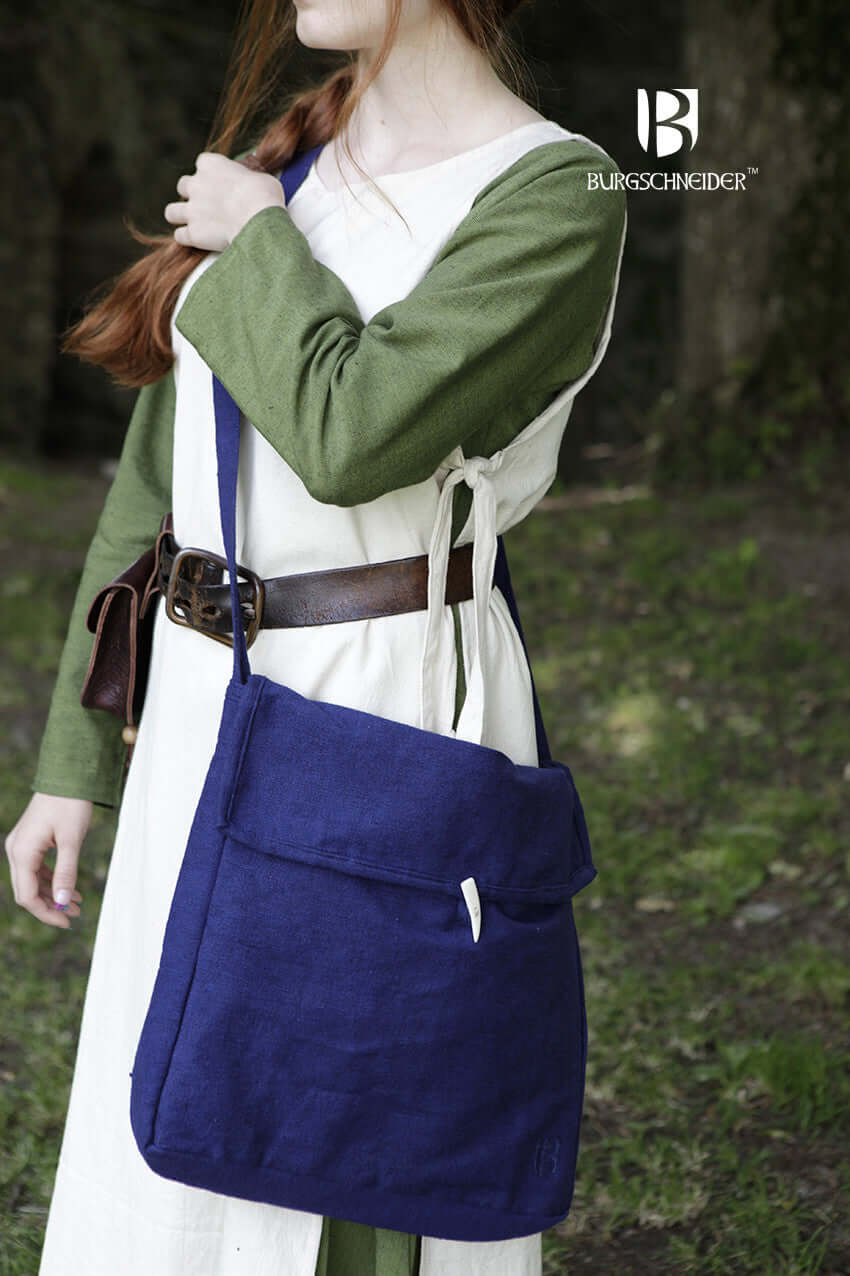 Bag Ehwaz shown on a model wearing medieval attire, crafted by Burgschneider, made from unkempt cotton for authentic style.