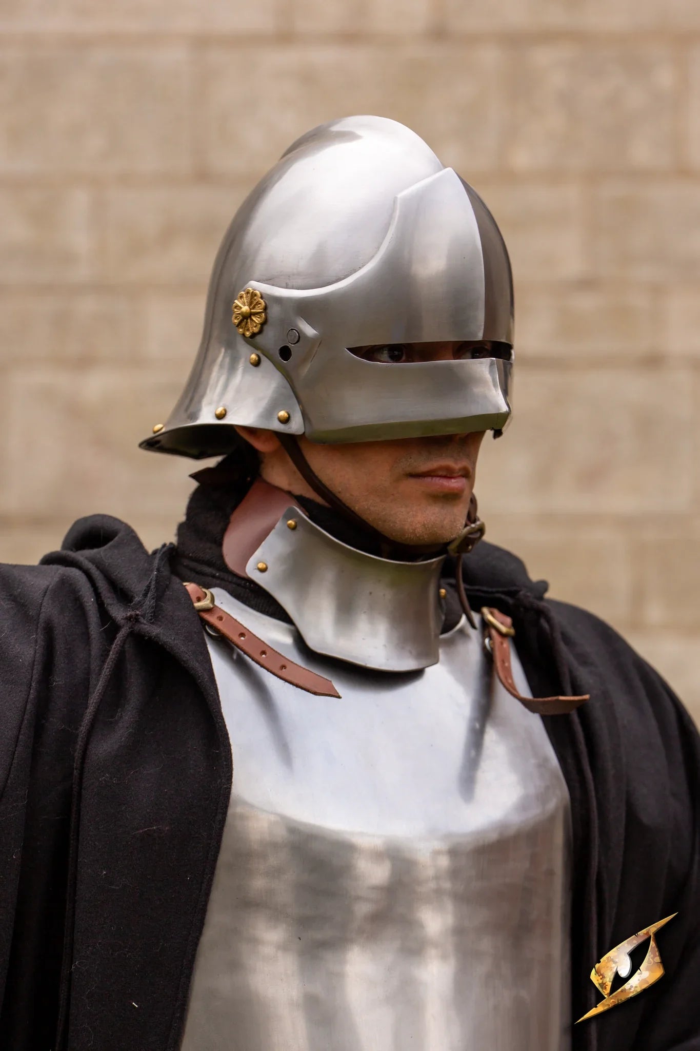 Renegade Helmet worn by a soldier, showcasing detailed metallic design and a warrior's attire.
