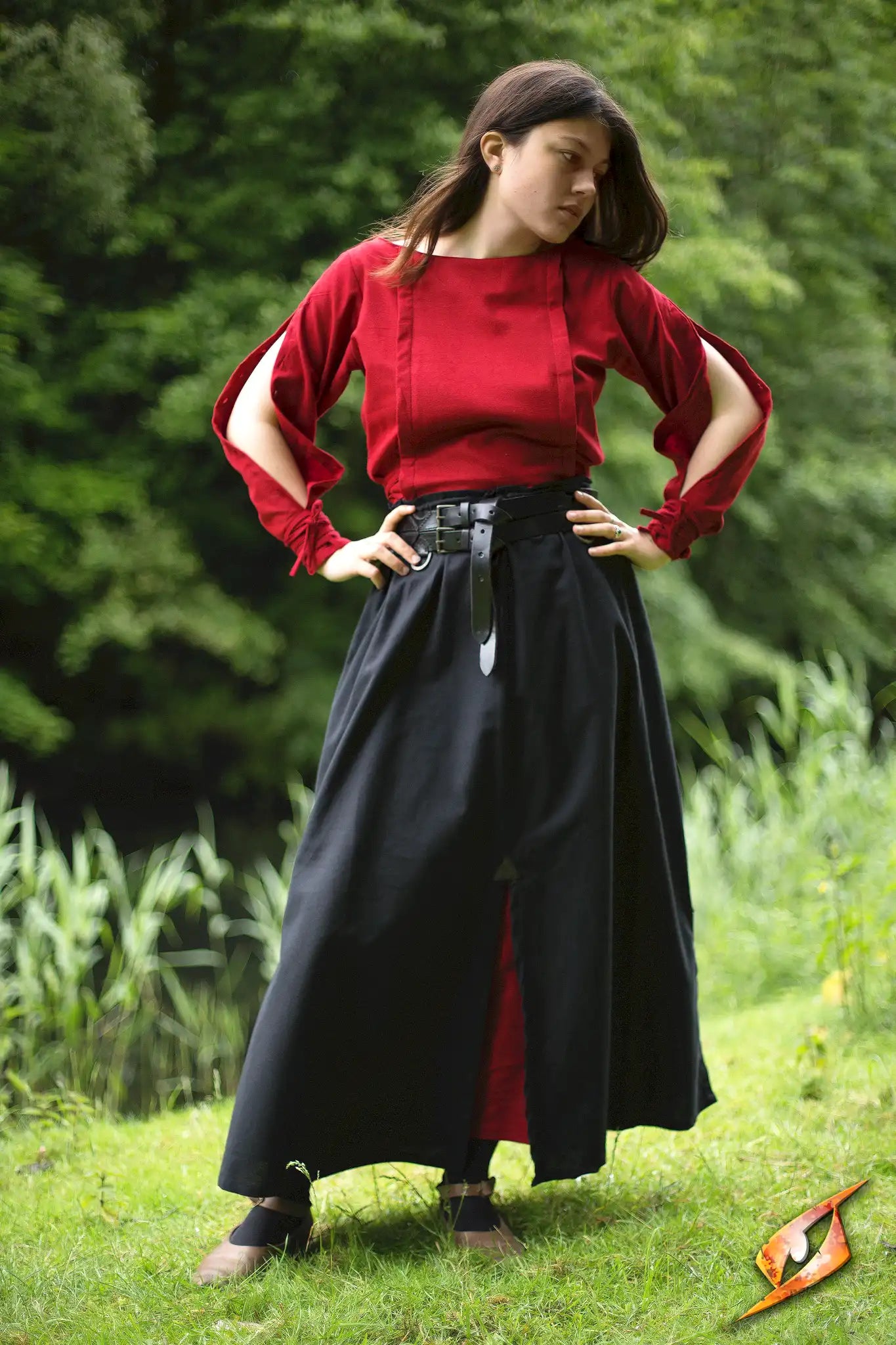 Battle Skirt featured on a model, showcasing its heavy cotton design and slits for movement.