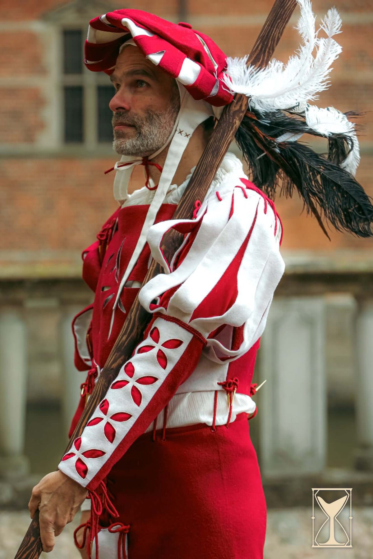 Landsknecht Bloom Sleeve detailed view showcasing slashed and petal motif design in a vibrant costume.