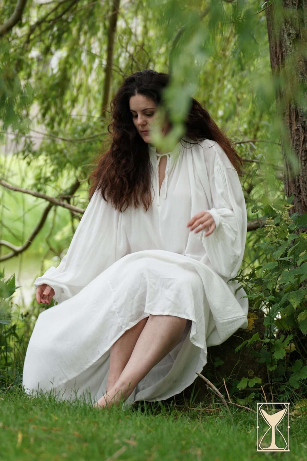 Smock Violet light and lovely medieval undergarment worn outdoors, showcasing a loose-fitting white chemise in nature.