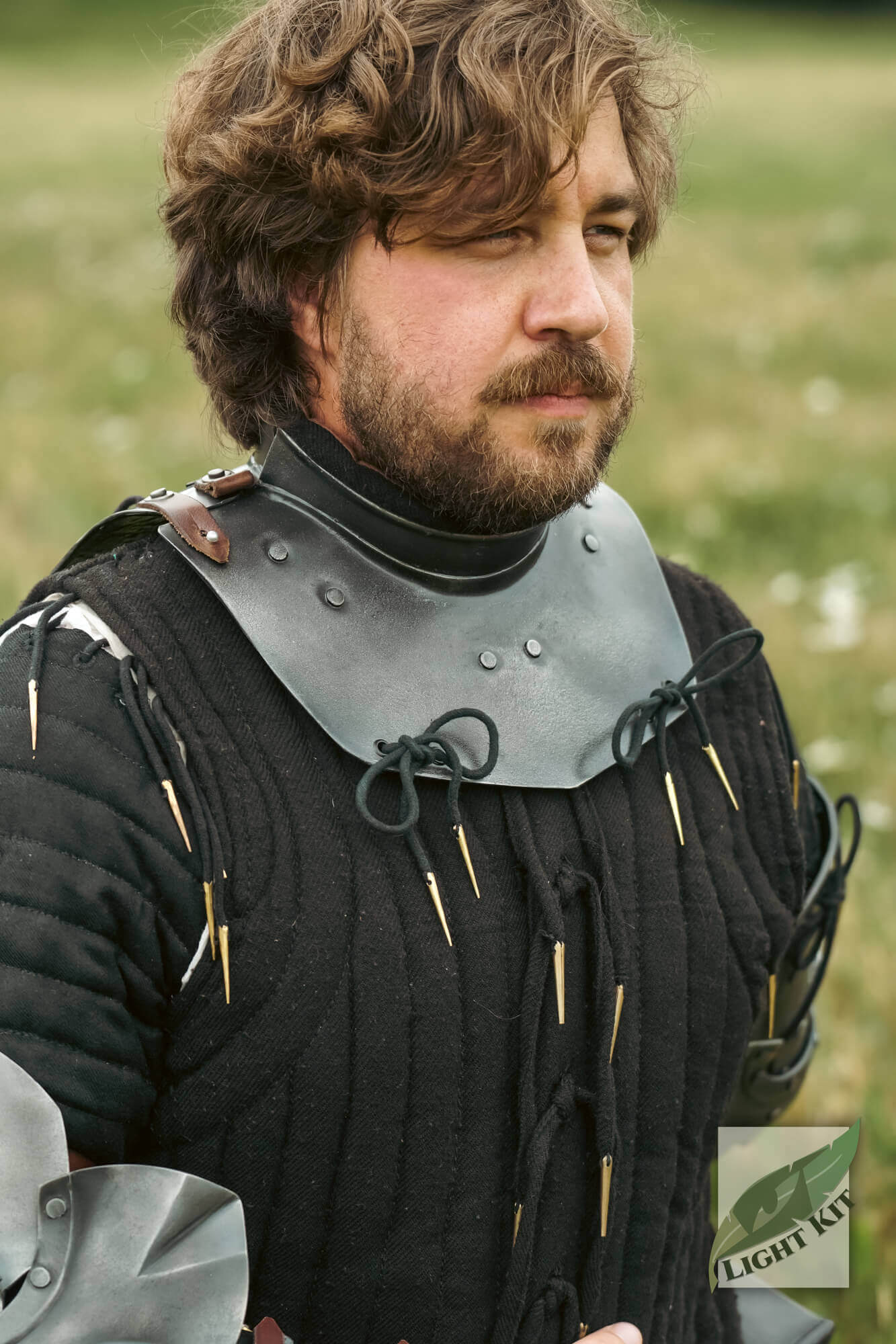 Man wearing Captain Gorget - Light Kit with standing collar, showcasing polyurea armor protection and historical style.