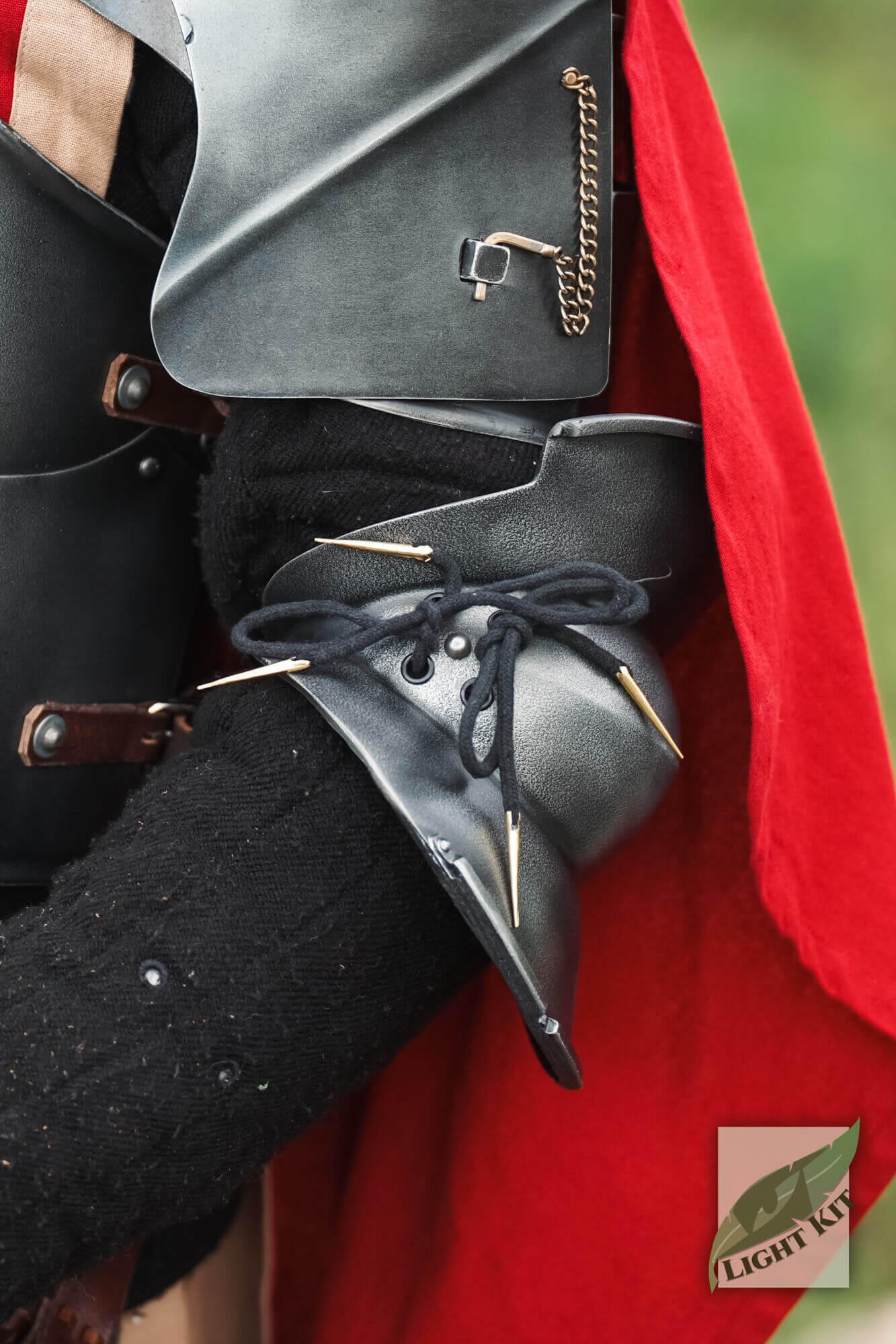 Milanese Couters - Light Kit showcasing protective elbow armor with high-density polyurea material.