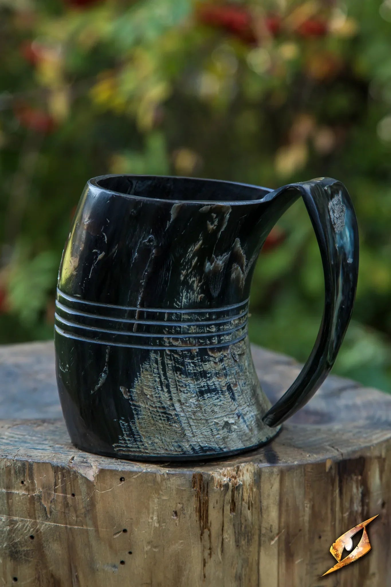 Savage Mug made of genuine horn, featuring four horizontal etched lines, perfect for hydration and libation.