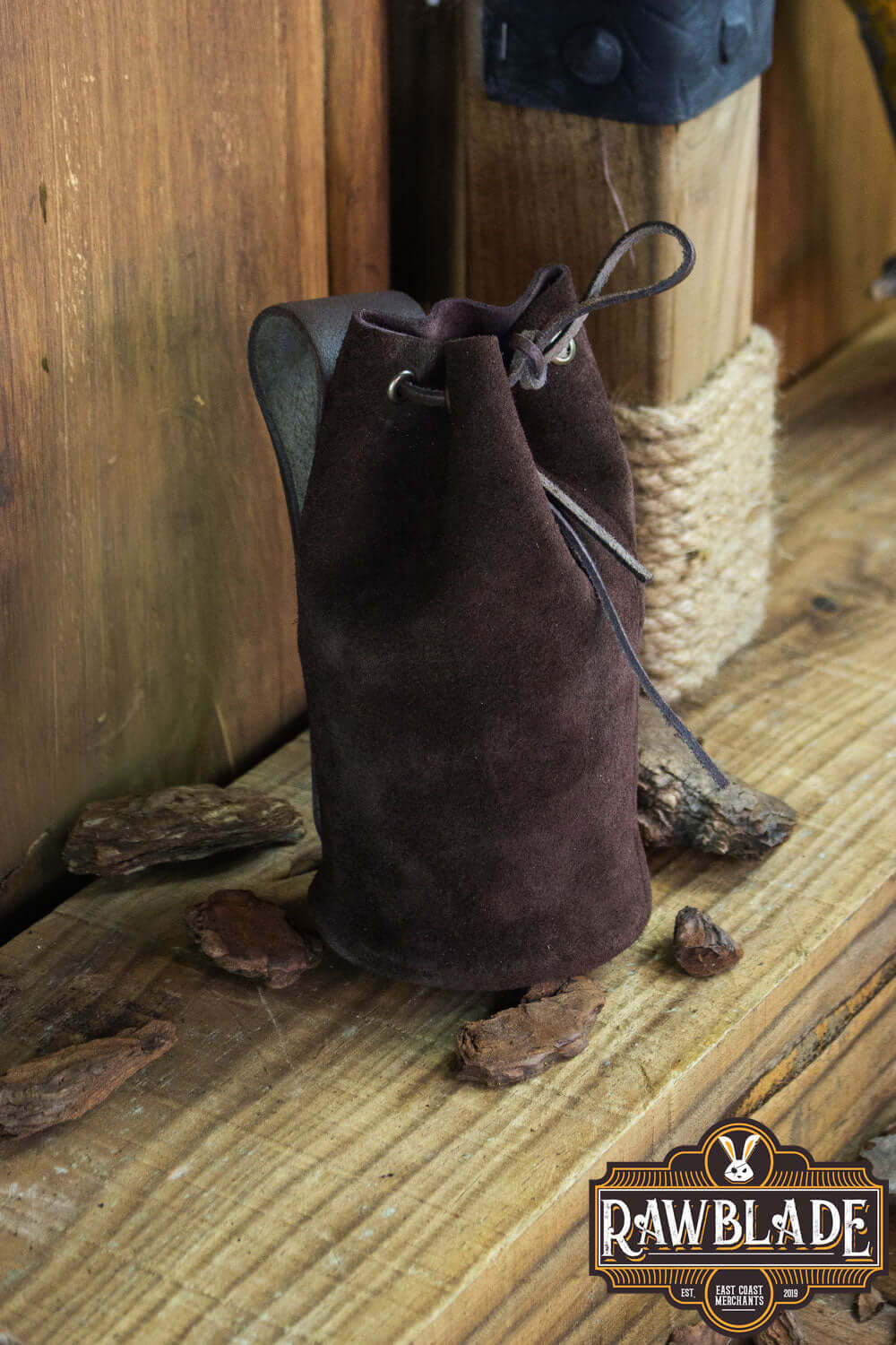 Adventurer Tube Pouch made of suede, ideal for carrying various items during adventures.